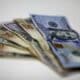 Dólar sobe ante real com investidores buscando proteção antes do feriado
