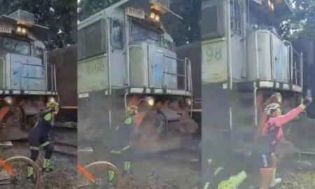 Ciclista atingida por trem