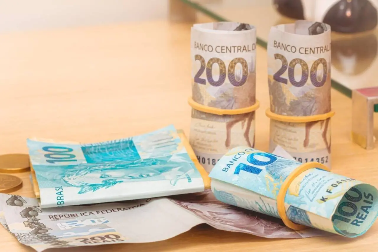 dinheiro retirada saque beneficios notas