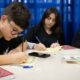Aluno monitor, estudante ensino escola