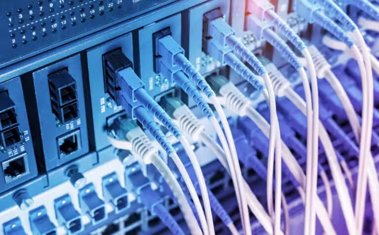 Fiber,Optic,Cables,Connected,To,An,Optic,Ports,And,Network