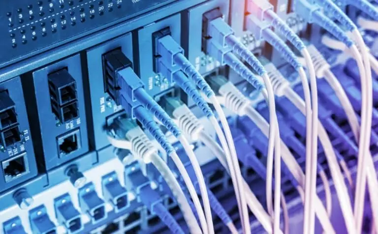 Fiber,Optic,Cables,Connected,To,An,Optic,Ports,And,Network