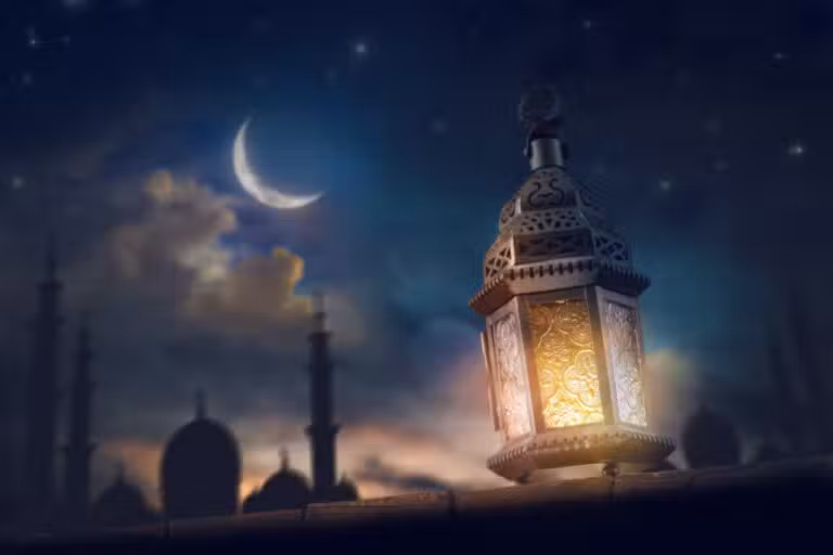 Ornamental,Arabic,Lantern,With,Burning,Candle,Glowing,At,Night.,Festive