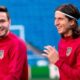 Saúl Ñíguez e Filipe Luís