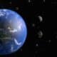 Planeta Terra e asteroide