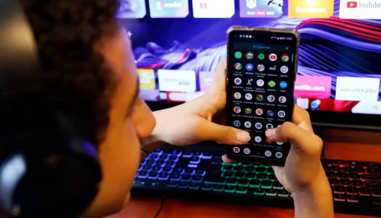 young man using cell phone