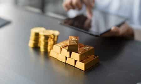 Barra de ouro, moedas em ouro