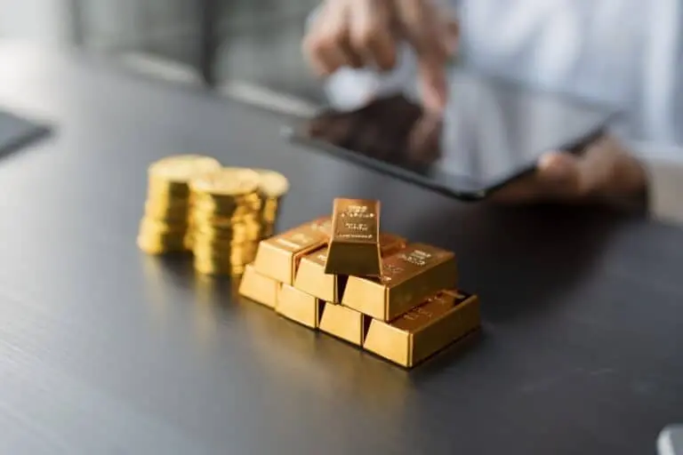Barra de ouro, moedas em ouro