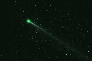 High-precision lenses capture the greenish trail of a celestial body on the African continent