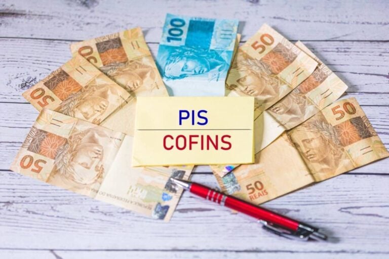 Pis/Cofins, dinheiro, caneta