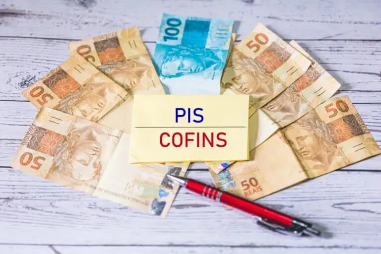 Pis/Cofins, dinheiro, caneta