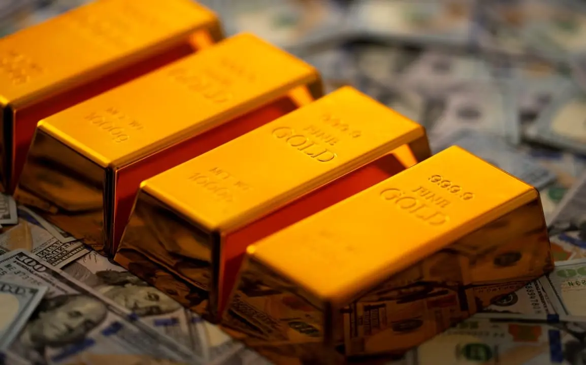 Barras de ouro, dólar