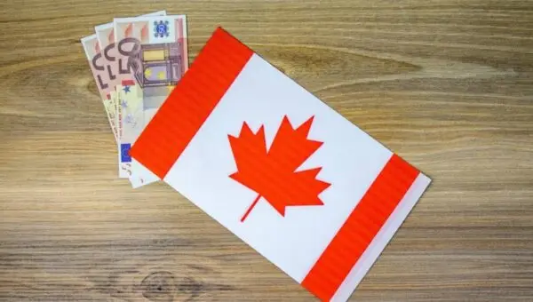 Moedas e bandeira do Canadá