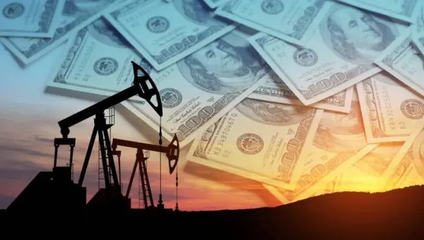 Bomba de petróleo sobre fundo de dólares