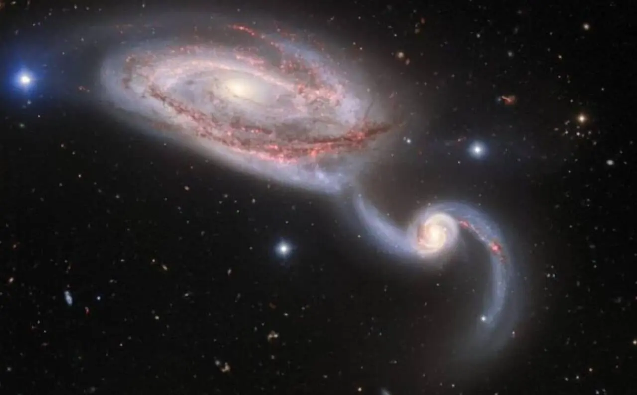 Galáxias interagindo NGC 5394 e NGC 5395