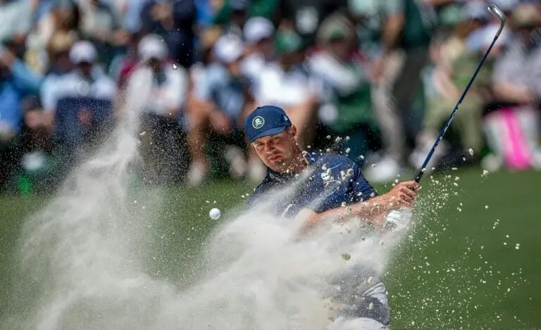 Bryson DeChambeau of the United States plays a stroke from a bunker on the No. 11 hole during the first round of the Masters at Augusta National Golf Club, Thursday, April 09, 2026 - (Photo by Kohjiro Kinno/Augusta National/Getty Images)
