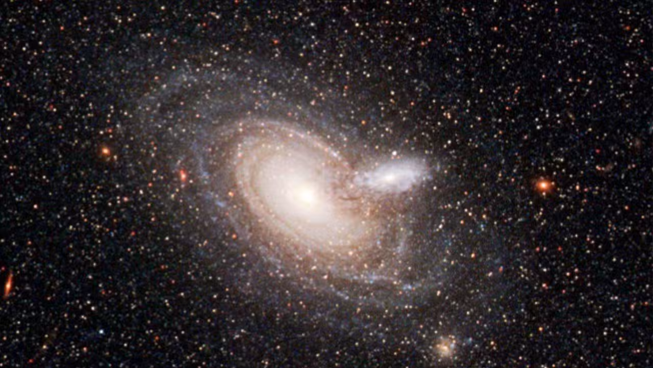 Duas galáxias espirais na constelação de Sculptor - Telescópio Espacial Hubble/NASA, ESA