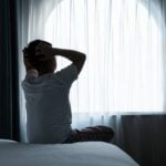 Criança com dor de cabeça - baona/Istock.com