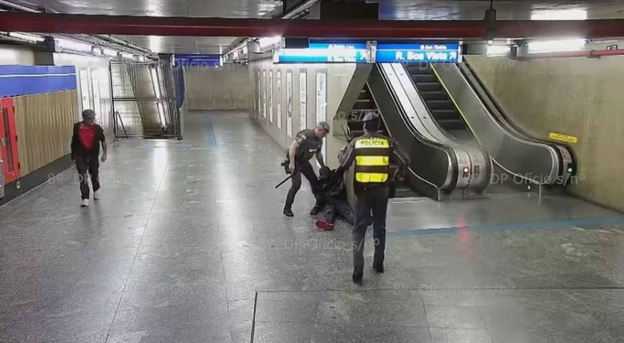suspeito baleado é abordado por policiais