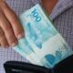 Dinheiro, real, notas de cem reais, carteira - gustavomellossa/ istockphoto.com