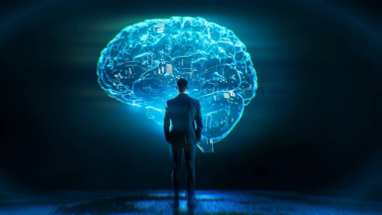 Empresário olhando imagem de inteligência artificial - Gorodenkoff / shutterstock.com
