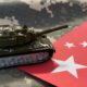 Tanque de Guerra e bandeira da China - Andrew Angelov / shutterstock.com